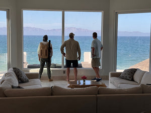 Guests admire the view from the Fish Ranch Villa in La Ventana during a visit to our pop up fly shop while booked on a La Ventana custom package 
