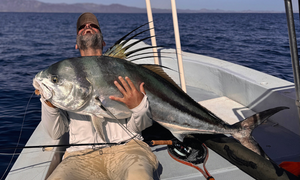 All smiles after landing a hog of a roosterfish during a custom package fly fishing trip booked with The Fish Ranch in La Ventana BCS 